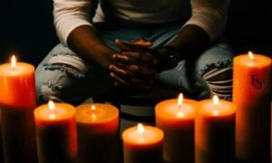 Candles with prayers for peace, healing, guidance, protection, comfort, hope, and spiritual reflection.